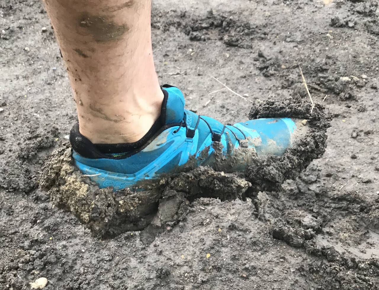 Mud-caked shoes