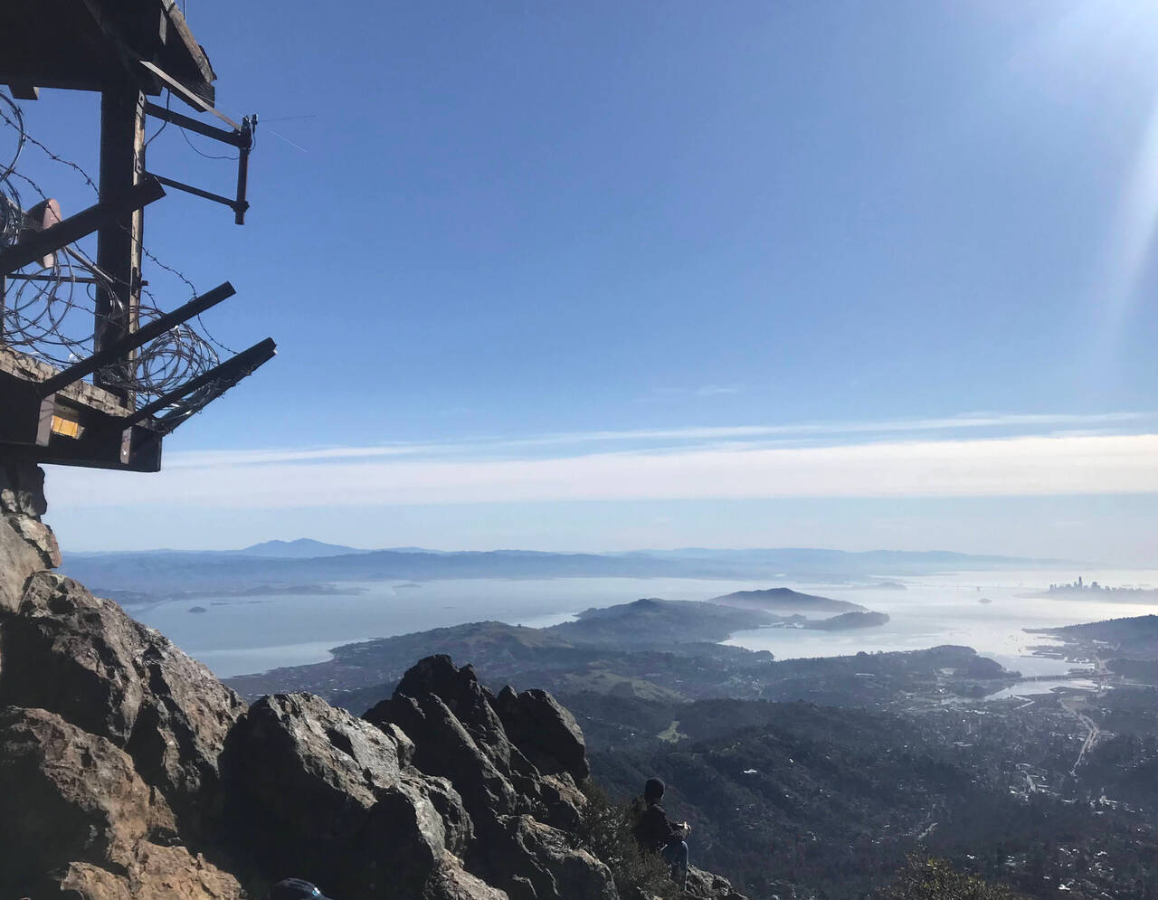 Overlooking the Bay Area, next to the fenced off observation platform of the East Peak of Mount Tam