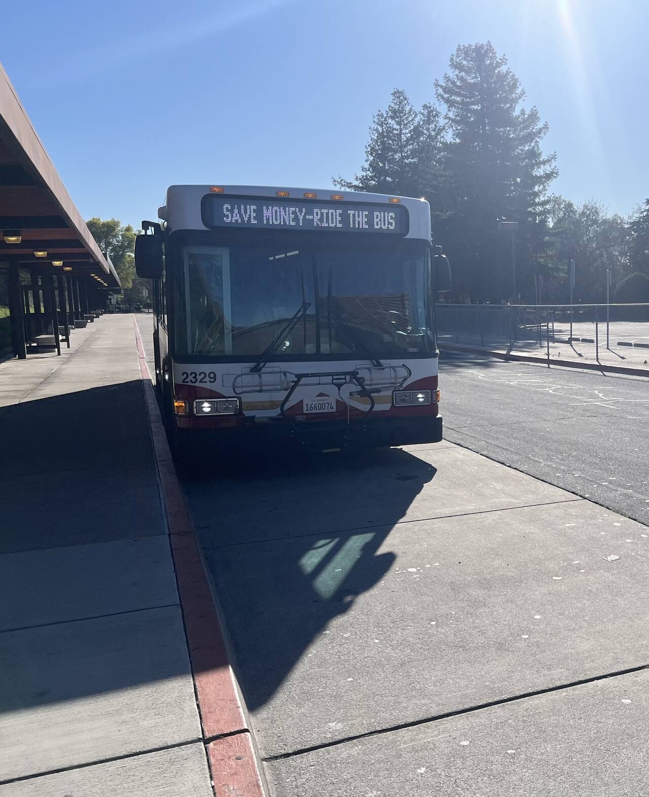 A photo of the County Connector bus. The sign reads "Svae Money - Ride the Bus".