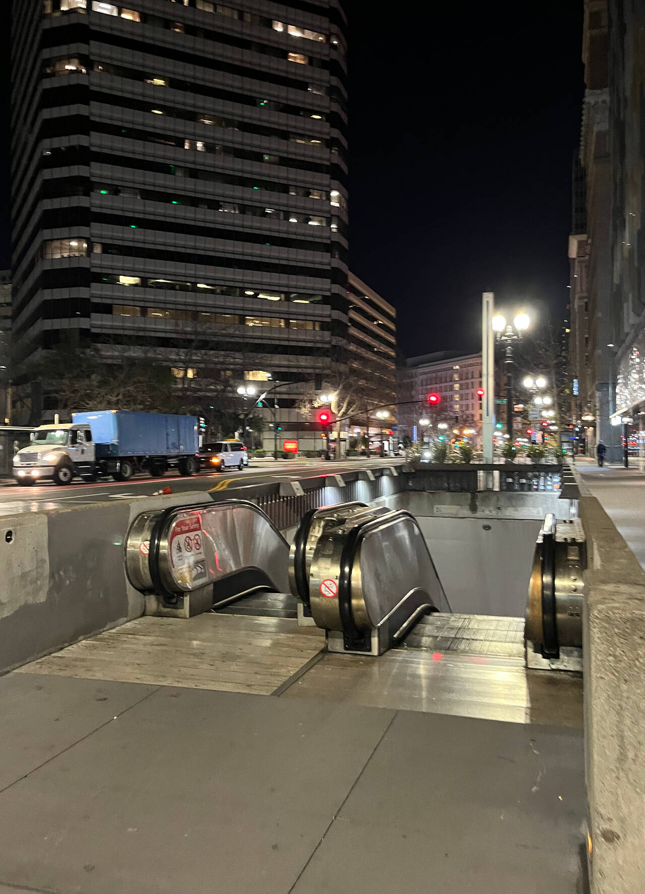 The 12th Street Oakland BART station entrance, from street level, at 5:00 AM