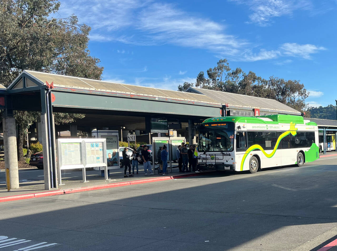 A bus waits at San Rafael