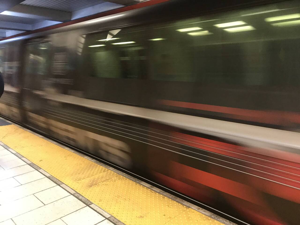 The BART train pulls into the 12th Street station